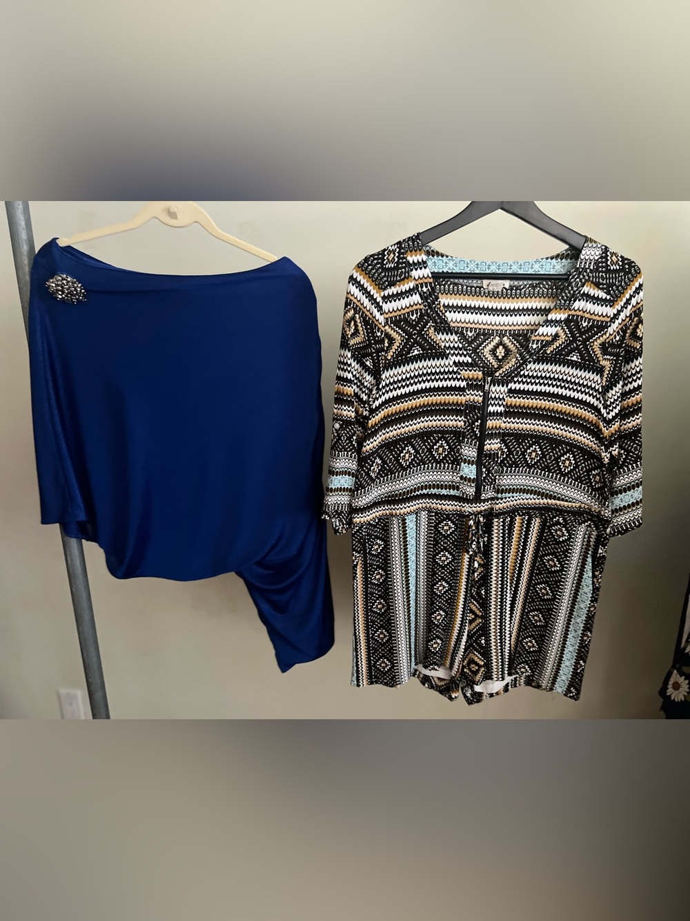 boho-style V-neck jumpsuit features a distinct geometric aztec pattern and casua